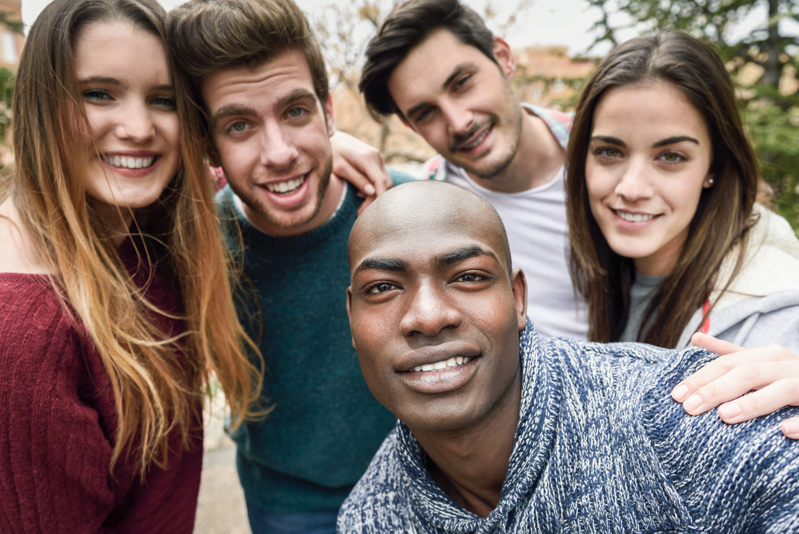 Multiracial Group Of Friends Taking Selfie